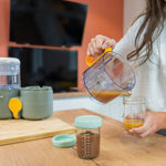 BadabulleKontenitorUshqimi Qelqi