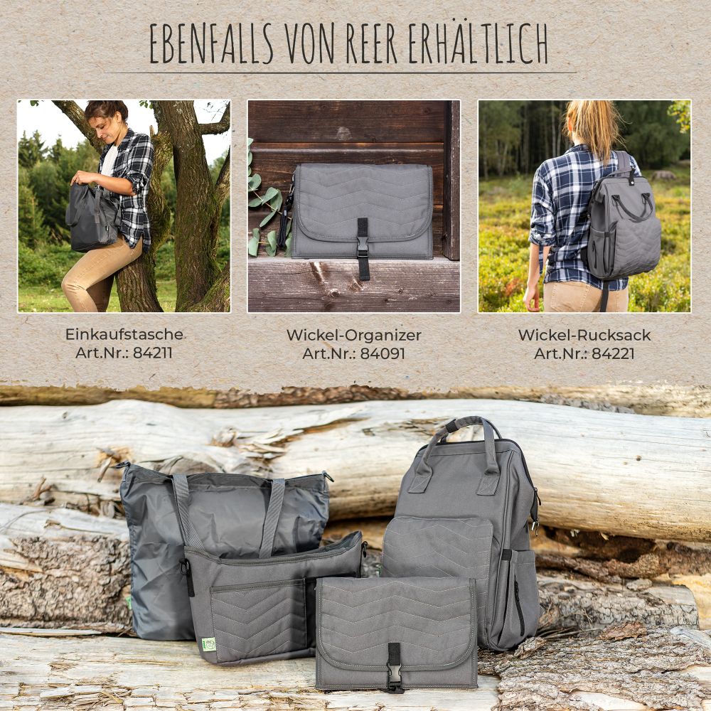 Growing stroller organiser with changing mat